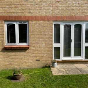 ARCHED TOP FRENCH DOOR AND WINDOW FRAMES INSTALLED